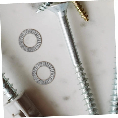 Premium 20 Piece Manganese Lock Washers With Double Wedge Tooth Design around screws on a surface for secure fastening.
