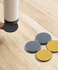 Side view of 12 Pack 2 Inch Teflon Furniture Glide Pads Self Stick Sliders For Carpet Tile Hardwood Floors Ground Protector