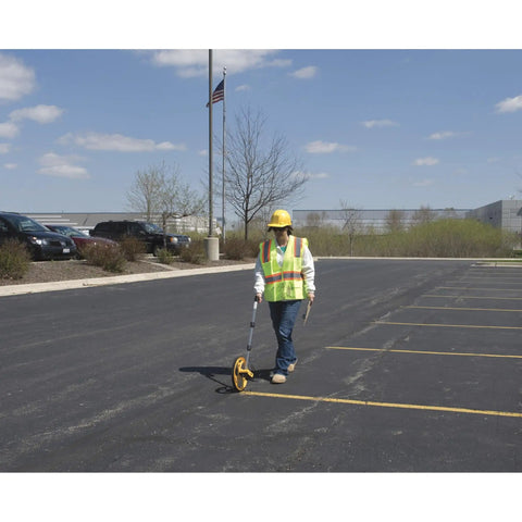 Contractor Grade Measuring Wheel For The Job Site With 3 Foot Circumference, Easy Read 5 Digit Counter, in use on pavement, USA made