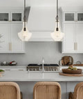 Sydney 15 Inch Modern Pendant Light With Vase Style Seeded Glass Shade Adjustable Height Oil Rubbed Bronze Finish in kitchen