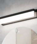 LED Bathroom Vanity Light Fixture Over Mirror 24.4 Inch Modern Rectangle Black Matte Metal Lighting Bar 4000K Daylight Wall Sconce Ideal For Powder Room And Guest Bath Damp Rated Easy Install Energy Efficient mounted above a mirror on a gray wall.