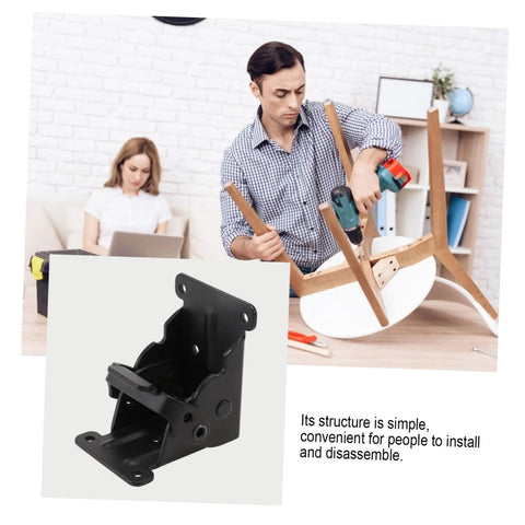 Veemoon 2pcs folding table leg hinges, black metal; installed on wooden chair legs; close-up hinge body view.