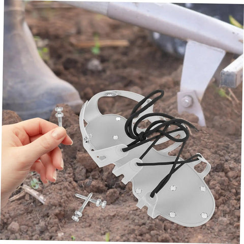 Hand holding detachable spike next to Heavy Duty Lawn Aerator Shoes Spikes Set With 20 Metal Spikes For Grass Shoes on soil