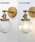 Vintage Industrial Wall Sconce Lighting Fixture with Five Point Nine Inch Round Clear Ribbed Glass Globe Antique Brass Gold Finish E26