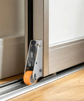 Heavy Duty Gate Support Wheel Quietly Fixes Sagging Wood Doors With Smooth Rolling Caster mounted on a door track.