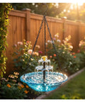 Solar Powered Cascade Hanging Bird Bath Fountain For Outdoors No Wires Needed Super Easy Setup Bubbling Water Feature With Solar Pump Bird Bath Dispenser Garden Yard Patio Decor Hummingbird Bath Blue in a garden setting.