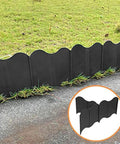 Black No Dig Interlocking Garden Edging Kit 40 Piece 20 Ft Long 5 Point 3 In Tall Plastic Landscape Border installed in lawn