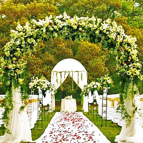 Wedding setup with floral arch and aisle, featuring Metal Garden Arbor Wedding Arch Black, Adjustable Two Size Options Pergola Style.
