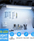 LED Shop Light Two Foot Energy Saving 20W 3000LM 6500K Daylight T8 Tube With Clear Cover installed above a workbench