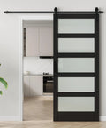 Tempered Frosted Glass Barn Door With Full Sliding Hardware Kit And Handle Solid Core Wood Build Delivers Serious Privacy Easy Diy Assembly Black Finish 36 Inch By 84 Inch installed in interior doorway