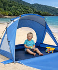 Child playing under Portable Beach Sun Shelter For Families And Groups, Grab And Go Easy Setup Cabana Tent With UPF 50 Plus UV Protection