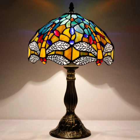 Sea Blue And Yellow Stained Glass Dragonfly Tiffany Table Lamp Dope Nautical Reading Desk Bedside Light For Bedroom Living Room And Home Office Decor 12 Inch Shade 18 Inch Tall UL Listed featuring colorful stained glass shade and antique bronze base.