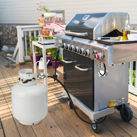 Universal QCC1 Low Pressure Propane Regulator With 12 Foot Hose connecting grill to propane tank on patio