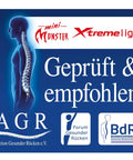 Image of a spine illustration on a product label for mini Monster Xtreme light, promoting back health.