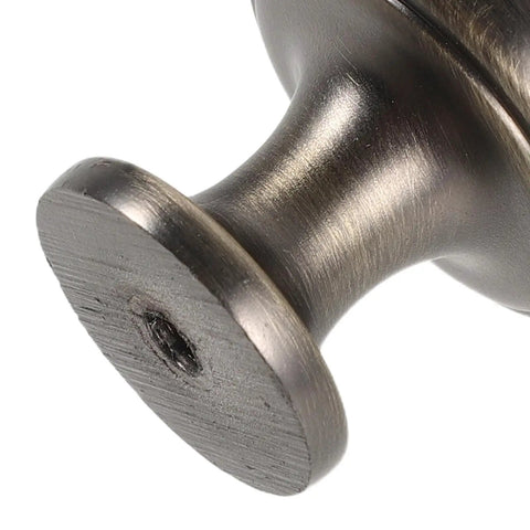 Close-up of 4 Pack Brushed Zinc Alloy Cabinet Pulls Single Hole Drawer Handles showing solid build and secure grip.