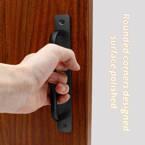 Hand holding 2 Pack Aluminum Alloy Sliding Barn Door Handles With Mounting Plates Black Finish 8.5 Inch Total Length 192 Mm Hole Center