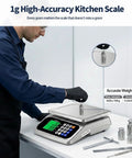 Person using Large Digital Kitchen Scale With 66Lb Capacity And 30Kg, 0.05oz Per 1g Precision, Price Computing And PCS in lab setting.