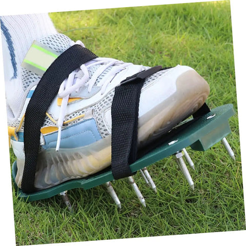 Close-up of foot wearing aerator shoe with 20 Piece Lawn Aerator Shoes Spikes Replacement Metal Pegs, outdoors on grass.