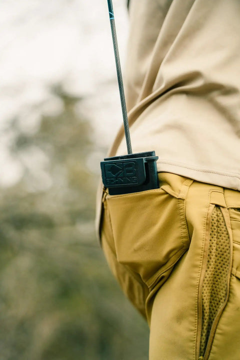Pocket Quiver Holds Six Arrows Clip In Back Pocket showing arrow secure in compact, pocket-friendly design