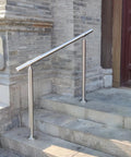 Hella Sturdy 3 Step Outdoor Handrail With Zero Sweat Diy Install Pack And Rugged 304 Stainless Steel Build For Porch Stairs On Concrete Brick Or Wood Planks Silver Finish Smooth Ride installed on outdoor stone steps.