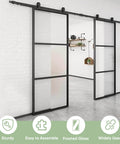 Two 36 Inch By 84 Inch Frosted Glass Barn Door Panels With Top Mounted Hardware And Soft Close Kit 72 Inch By 84 Inch Interior Sliding Glass Door In Black Carbon Steel Frame Dope Sleek Look installed view