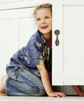 Child next to vintage cabinet with 10 Pack Dope Vintage Style Zinc Alloy Drawer Pulls With Single Hole Design For Easy Install And A Secure Fit