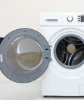 Front-loading washer with open door; gray door frame and visible stainless drum.