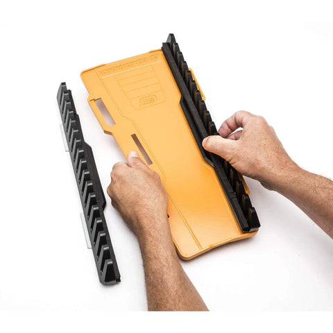 Hands assembling the Two Piece Reversible Wrench Rack Set With 16 Slots Per Rack For Up To 32 SAE And Metric Wrenches Up To 1 Inch Or 25 Mm