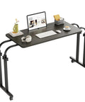 Super Adjustable Mobile Recliner Desk With Smooth Cruising Wheels Hella Flexible Overbed Table For Laptop Working, black metal legs and wooden top.