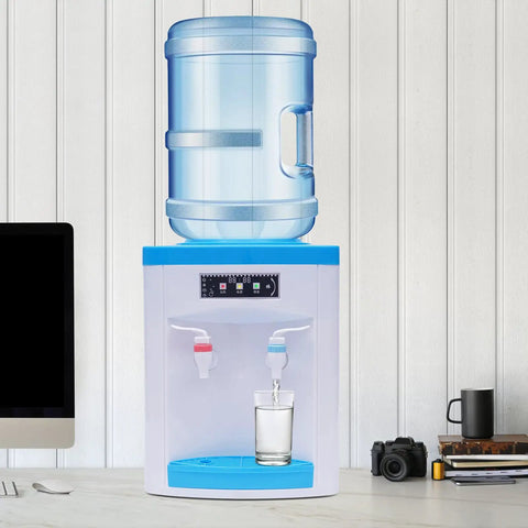 Hot And Cold Water Desktop Dispenser For 1.3 To 5 Gallon Jugs Top Loading Countertop Cooler with glass filling with water