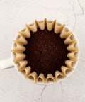 Top view of Unbleached 1-2 Cup Coffee Filters Pack Of 50 For Small Basket Style Pour Over And Drip Coffee Makers Eco Friendly Natural Brown Paper