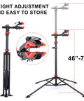 Bike Repair Stand For Home Shop And Mobile Mechanics Lifts Your Ebike Mountain And Road Bike For Quick Maintenance Adjustable Height Safe Clamp Foldable Design For Easy At Home Tune Ups depicting foldable design and adjustable height range from 46 to 78 inches.