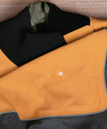 Aquaseal FD Flexible Durable Repair Adhesive On Wader Fabric Demonstrating Clear Patch Repair Detail On Neoprene Material