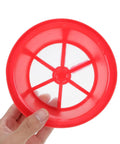Person holding red 142mm backpack sprayer filter basket, mesh center, agricultural barrel filter for knapsack sprayer replacement