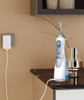Replacement Charger For Water Flosser WP360 WP360W WP462 WP462W WP450 WP450W WP465 WP440 WP100 Two Prong AC Adapter White in use
