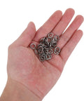 Hand holding 200 Piece Stainless Steel Spring Lock Washers Set For Furniture DIY Projects Grab And Go Easy Install Anti Loosening Gaskets
