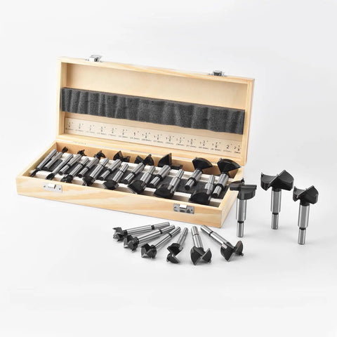 Heavy Duty Carbide Tipped Forstner Drill Bit Set Packs Sixteen Badass Sizes in wooden case for precise woodworking tasks.