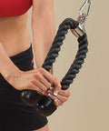 Heavy Duty Triceps Rope With High Carbon Steel Swivel held by woman for exercise in gym