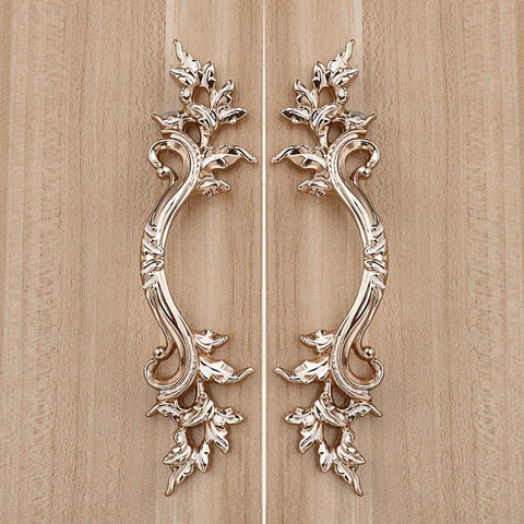 Pack Of 5 European Style Vintage Cabinet Handles And Drawer Pulls Antique Dresser Knob Set For Cupboards And Cabinets With Retro Charm Golden Finish And Included Mounting Screws Ideal For Cabinets Cupboards Dressers And Chests shown in gold on wooden cabinet