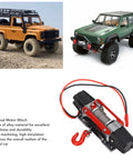 Check Out This Insane Dual Motor Rc Winch With Realistic Cnc Metal Build For 1/10 And 1/8 Scale Off Road Cars, showing alloy winch and RC trucks.