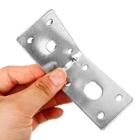 Hand holding 5 Pack Small Corner Shelf Brackets L Shaped 90 Degree for Wood Furniture Heavy Duty Silver Brackets