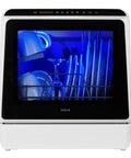 Compact Countertop Dishwasher With Six Wash Cycles And A Built In Five Liter Water Tank Needs Absolutely No Plumbing Hookups Fast Setup Delivers Top Tier Cleaning To Any Space Making Busy Routines An Absolute Breeze, showing dishes inside with blue lighting.