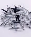 Beefy Heavy Duty Large Flange Aluminum Blind Rivets For Metal Three Sixteenth Inch By Five Eighth Inch Grip Four Point Eight By Sixteen Millimeter Pop Rivets Pro Grade 50 Piece Pack DIY Projects And Repairs scattered on white background