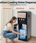 Woman using Bottom Loading Water Dispenser With Hot Cold Three Spouts And Indicator Light Panel For Home And Office Use Champagne Gold Finish