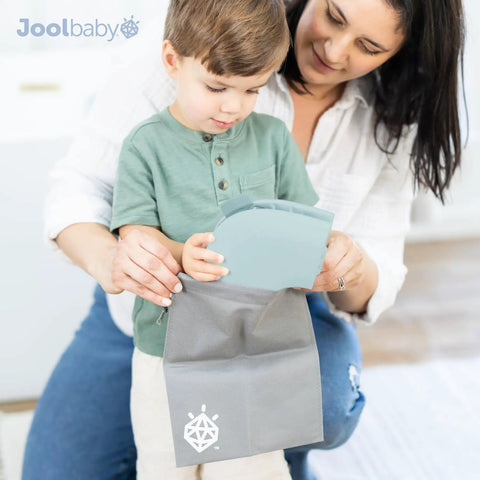 No Sweat Folding Travel Potty Training Seat For Little Ones With Super Simple Pull Tab and Compact Foldaway Design being used by a child.