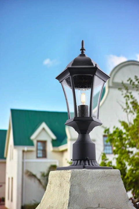 Outdoor Post Light Fixture With Pier Mount, 20-Inch High Matte Black Lantern With Clear Seeded Glass on stone base.