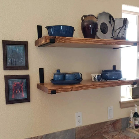 Black Heavy Duty Shelf Brackets 2 Pack Badass J Brackets With Lip For DIY Floating Shelves, supporting wooden shelves with dishes.