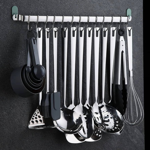 Kitchen Utensil Rail Organizer - Wall Mounted Gourmet Rack With 14 Hooks displaying spatulas and ladles