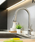 Top Shelf Brushed Nickel Kitchen Faucet With Smooth Pull Down Sprayer And High Arc Single Handle Lever in modern kitchen setting.