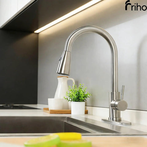 Top Shelf Brushed Nickel Kitchen Faucet With Smooth Pull Down Sprayer And High Arc Single Handle Lever in modern kitchen setting.